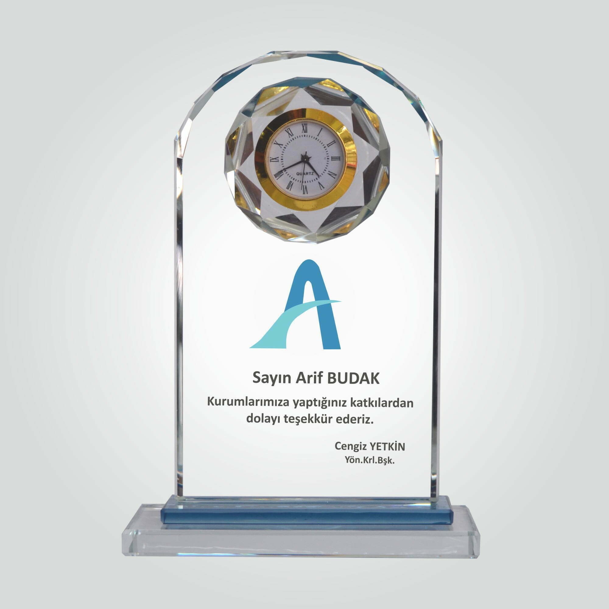 Şeffaf Kristal Cam Saatli Katkı Teşekkür Plaketi 1 Şeffaf Kristal Cam Saatli Katkı Teşekkür Plaketi
