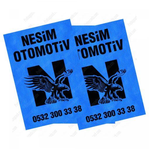 Baskılı tela oto paspas - Spunbond tela kumaştan üretilmiş, kurumsal logolu hijyenik araç taban koruma çözümü. 35x50 cm ve 40x50 cm ebat seçenekleri ile otomotiv sektörü için dayanıklı ve hijyenik paspaslar.